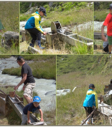  Immer gefragt bei Kindern-spielen mit den Wasserrädern beim Gschwezbach .